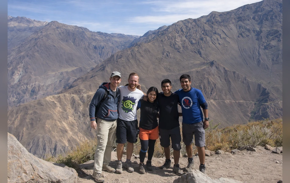 Group of hikers posing during a trekking tour in the scenic Colca Canyon. | Inca Culture Travel