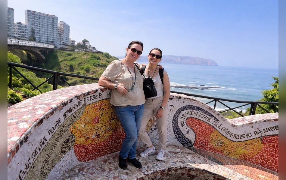 Couple smiling at Parque del Amor in Miraflores with the Lima coastline background. | Inca Culture Travel